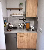 "Комната с мини-кухней и уютным двором"